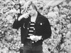 Black and white video clip featuring some hunky rocker dudes