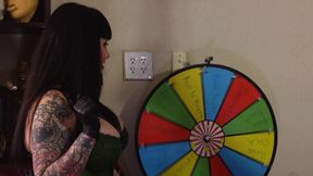 Dommes play Wheel of Fortune (misfortune?) with their Slave's Holes