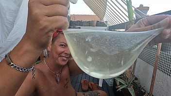 Drinking cum &amp_ piss cocktail from a condom