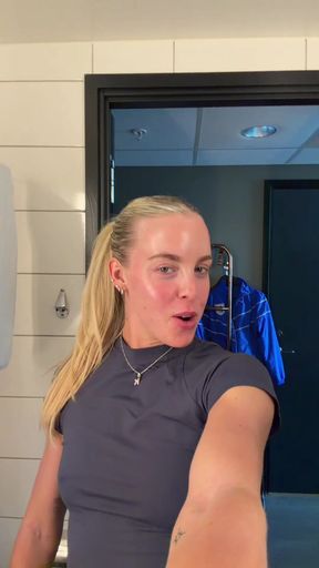 Athletic fitness model plays at the gym