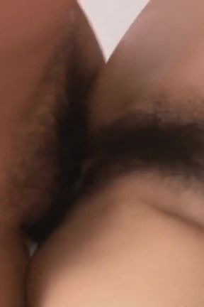 A hairy girl bends over as a huge cock drills her pussy from behind