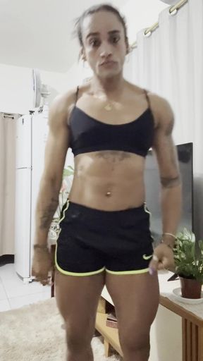 Muscular MILF stands tall and shows off her athletic body