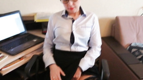 ”Office girl in stockings pleasures herself passionately”