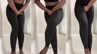 Her legs squirm while she holds her pee in the shower