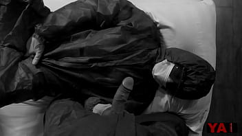 an infectious disease doctor in a protective suit jerks off a big cock to a colleague