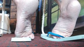 Filthy blue flip flops worn out
