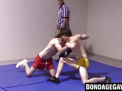 Slim gays spar intensely while stripping naked with hard cocks