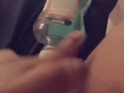 Naughty girl playing with mouthwash