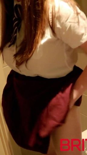 Student Taking A Piss on the Toilet