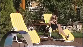 Lustful babes lick and suck huge member in a garden threesome