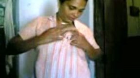Ugly a bit plump Indian brunette housewife plays with her natural boobs