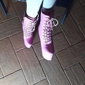 Sitting on a Chair in Pantyhose and High Heeled Boots
