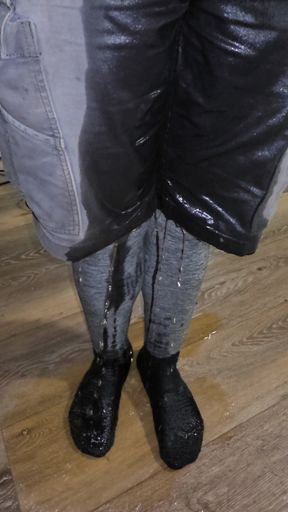Massive flood in gray and shorts saturates wool socks