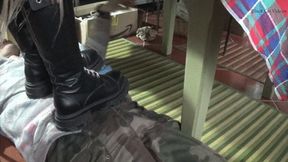 footstool under combat boots