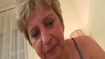 Horny cock munching granny gives her son in law a morning blowjob