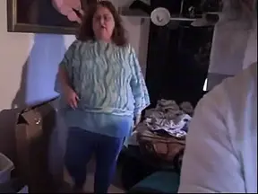 BBW redhead in blue outfit shows off her curves while dancing and taking