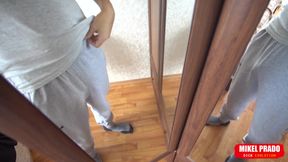 Guy posing naked in front of the mirror