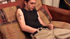 After rubbing up a stiff one, Sean unzips and starts stroking his hard cock and pleasures himself with his tongue. He eats his pre-cum, plays with his balls, and pumps out a huge cum gushing load.