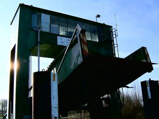 Blond Bombshell Teases with Shlong in Luxury Car