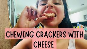 Chewing crackers with cheese