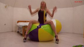 Alla is fucking hot and jumping on two big beach balls!!!