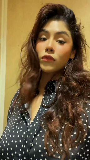 Woman in polka dot shirt