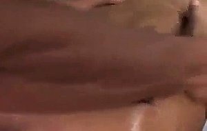 Sexy dude gets a massage from a strong muscled man