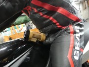 Leather biker milked on his motorcycle