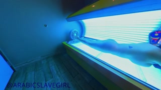 Arabic Slut has Orgasm in Public Tanning Bed