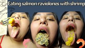 Eating salmon raviolones with shrimp