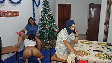 The two beautiful stepdaughters have lesbian sex on Christmas while the old stepfather talks on his cell phone.