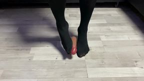 Sexy Dominatrix in Nylon Pantyhose Is Trampling Your Cock