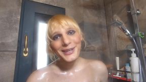 Nikki Lilith takes a steamy shower and rides a dildo