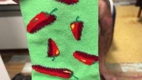 Playful Green Socks with Red Pepper Pattern pres. by Earl Smile