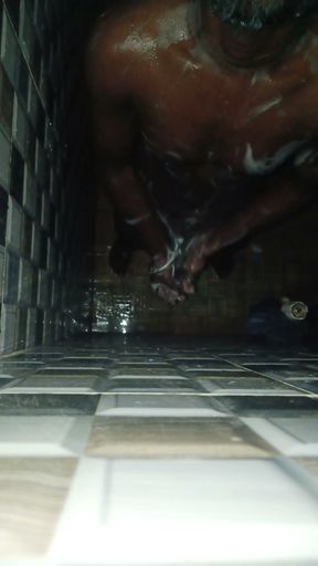 Hot Indian man bathing and playing and cleaning his big cock