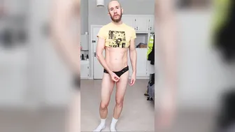 Muscular daddy jerks his big uncut cock in yellow shirt and white socks