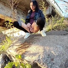 Pissing Slut in Stockings - Gushing on a Rock Under the Bridge