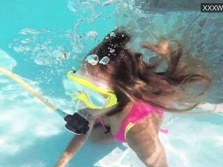 Irina Poplavok golden-haired pornstar in the pool