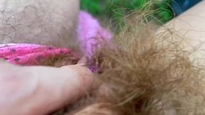 The succulent hirsute matriarch flaunts her juicy vulva during a sizzling sun-soaked seduction