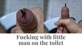 Fucking with little man on the toilet