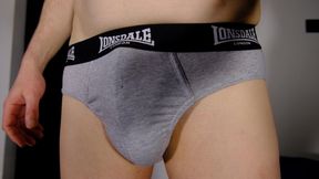 Close up underpants then show erect shaved uncut penis and foreskin as he masturbates he play with penis and underwear