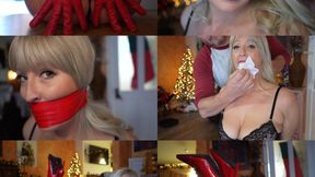 A festive hogtie, Anna hogtied and tape gagged (mp4)