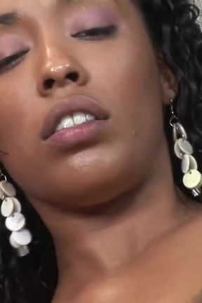 Oiled ebony babe gets fucked in her wet cunt