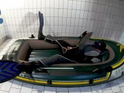 Wetsuit, Fins and Boat - geared pup pawing off