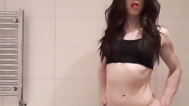 Transvestite showing sexy body and shooting a massive load
