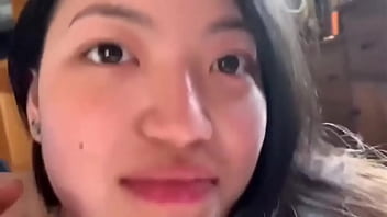 Young Chinese babe gets wet and wild