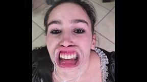 French maid tries to swallow her own piss through lip retractor