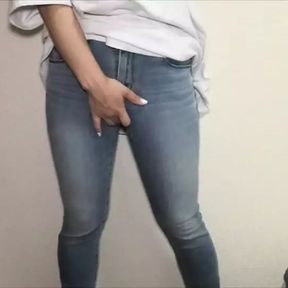 Cute girl in tight jeans stains her jeans with masturbation juice.