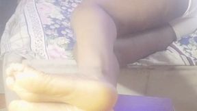 Igbo Omo Actress’ Glistening, Wrinkled Soles From Side Angle Lying Down