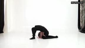 ”Black latex & braids very sexy Russian flexible teenie”